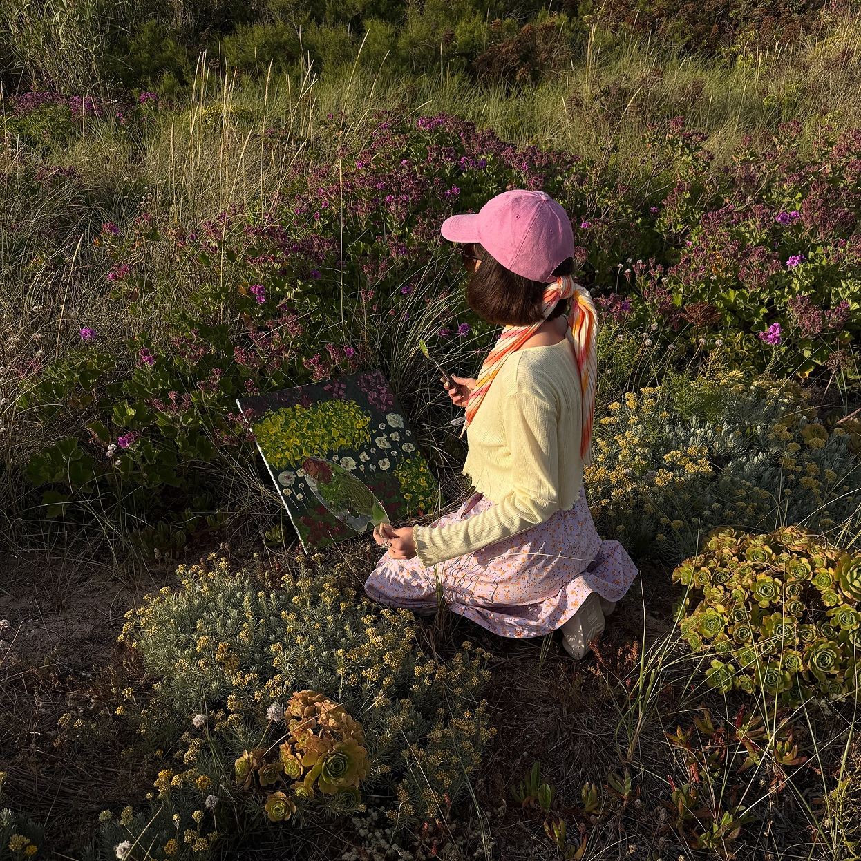 Painting among wildflowers in the dunes